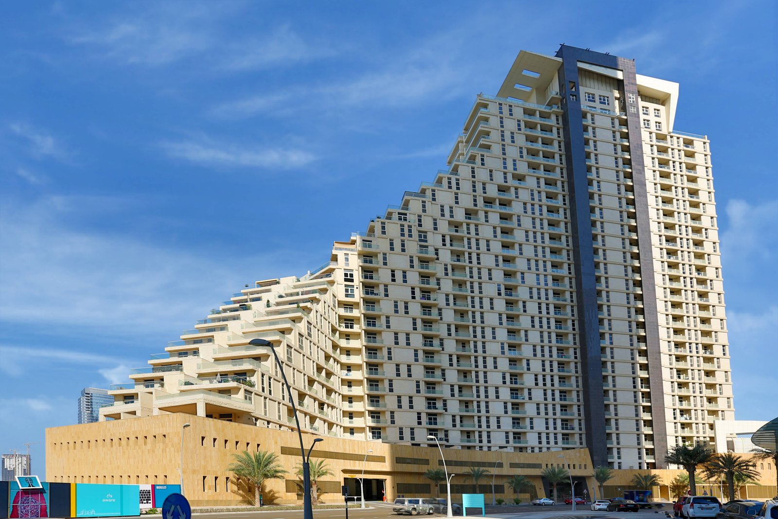 Panoramic exterior view of Mangrove Place, Shams Abu Dhabi, showcasing ready-to-move luxury apartments and waterfront terraces